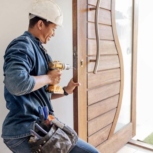 Locksmith, man and maintenance, handyman with home renovation and fixing, change door locks with po.